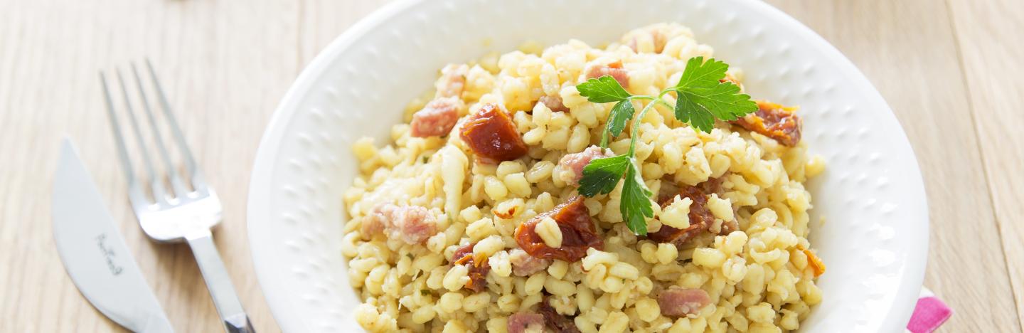 Risotto de blé aux tomates séchées et lardon